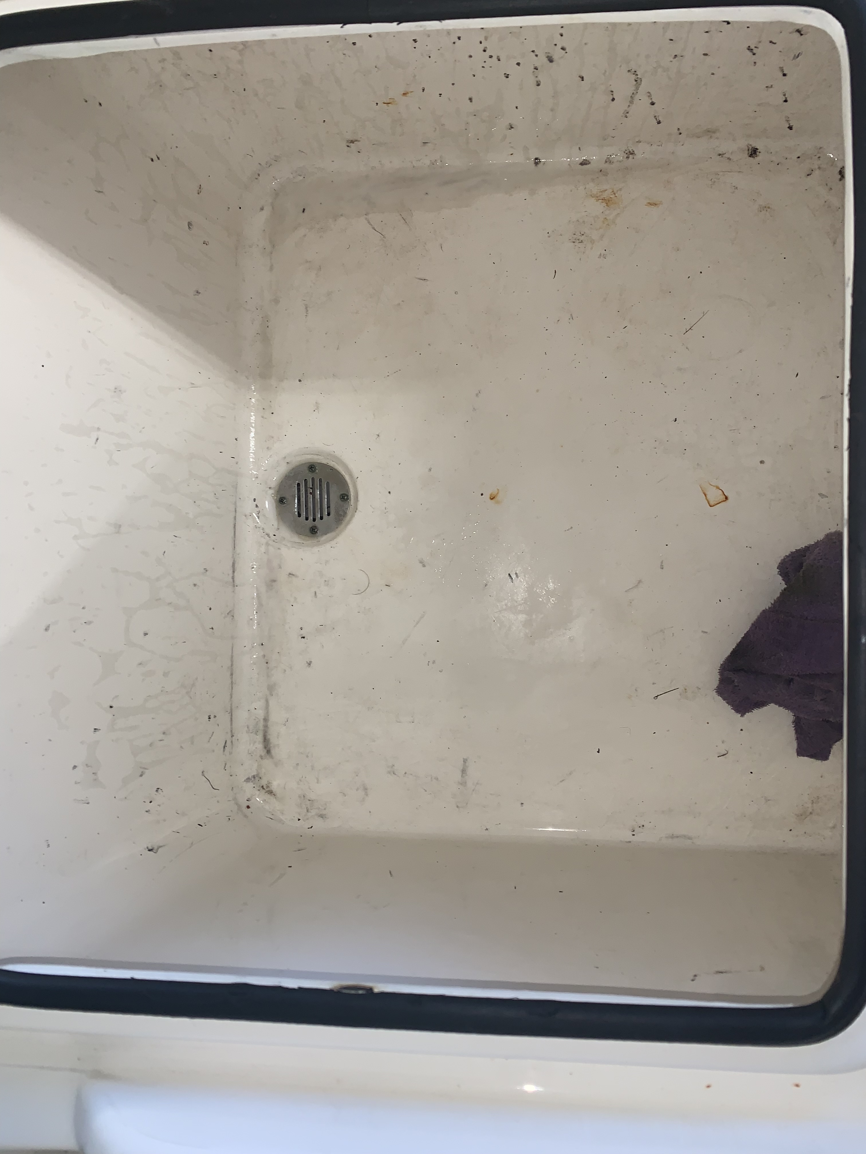 Livewell before — stained and dirty